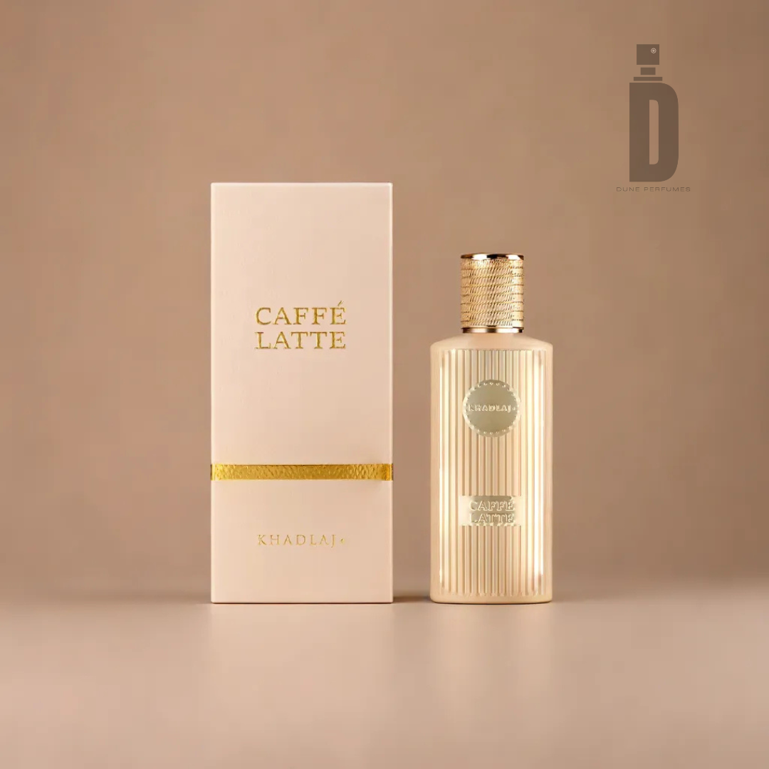 A beige rectangular box labeled "Caffe Latte 100ml EDP - Khadlaj" sits beside a ribbed bottle with a gold cap on a neutral background, exuding elegance. The coffee fragrance artfully blends sweet almond notes for a delightful aroma, featuring the Khadlaj logo discreetly in the corner.