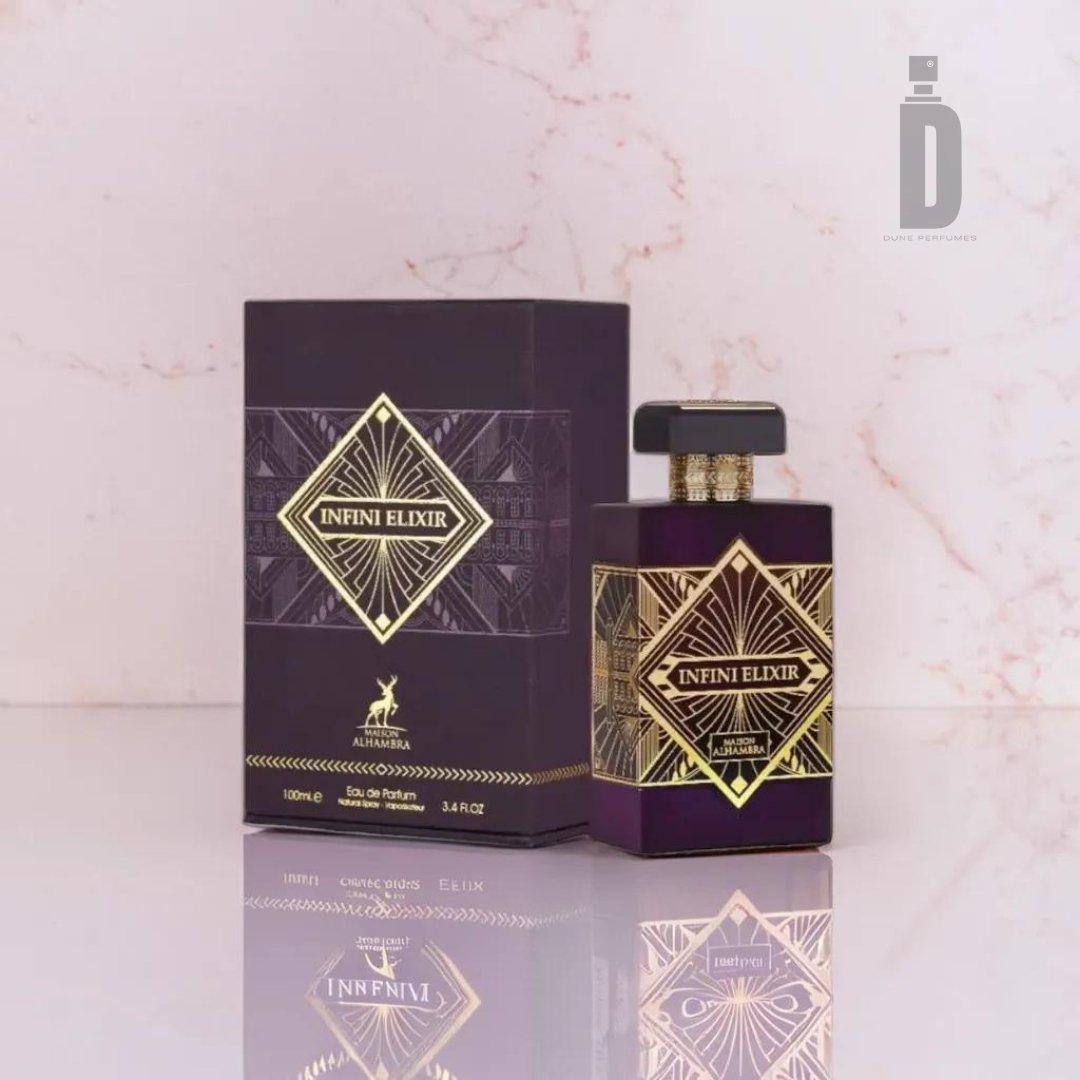 A perfume bottle labeled "Infini Elixir 100ml EDP - Maison Alhambra" from Maison Al Hambra, elegantly designed in a dark purple hue adorned with gold geometric patterns, sits next to its matching box. The box, featuring complementary gold accents and geometric designs, embodies eternal beauty. Both items are placed on a white marble surface, hinting at the enchanting fragrance within.